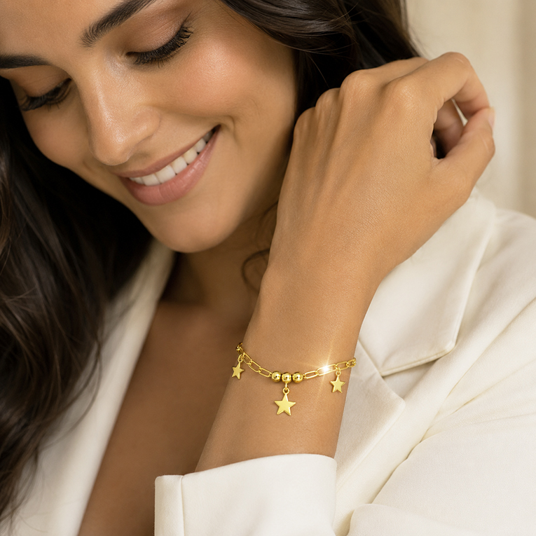 PULSERA ESTRELLAS CHAPA DE ORO 18 KT